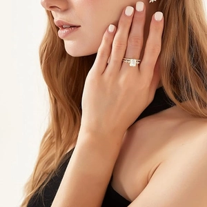 Elegant s925 silver gold plated ring with emerald cut zircon stone worn by a model
