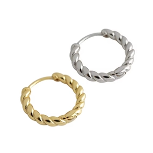 Detailed close-up of S925 sterling silver twisted rope hoop earrings in gold and silver