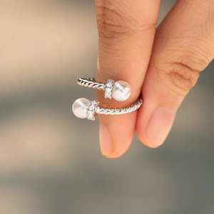 Minimalist S925 silver twist open ring featuring two pearls with zircon accents