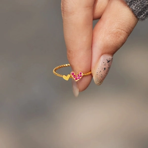 S925 silver golden twist ring featuring a pink heart zircon and small gold heart