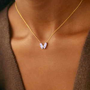Elegant S925 sterling silver butterfly necklace with purple zircons on model