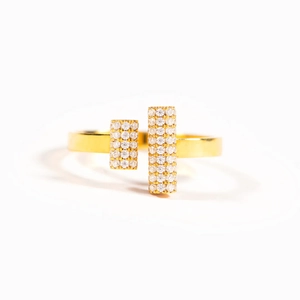 Adjustable S925 silver double T ring in gold with sparkling pave-set zircons on white backdrop