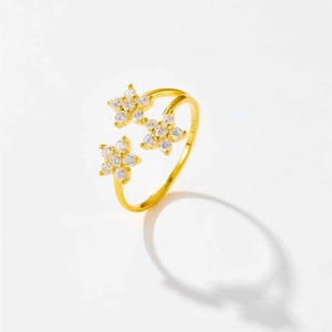 Macro shot of S925 hallmark on gold plated silver ring with zircon flower detail