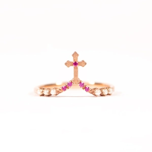 Rose gold V-shaped chevron ring with small pearls and pink gemstone cross pendant