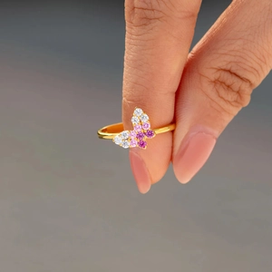 S925 sterling silver butterfly ring with gradient pink cubic zirconia on a gold band
