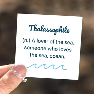 Minimalist S925 sterling silver wave ring with Thalassophile card on finger
