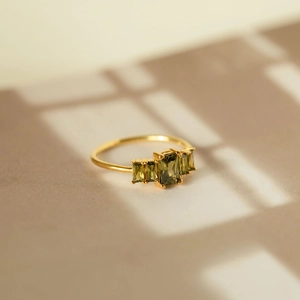 S925 sterling silver gold ring featuring five emerald green rectangular zircon stones