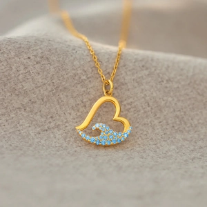 Élégant collier cœur vague en argent S925 doré avec pendentif en cristal bleu brillant