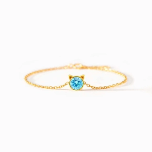Bracelet chat en argent S925 avec zircon bleu et finition dorée style minimaliste