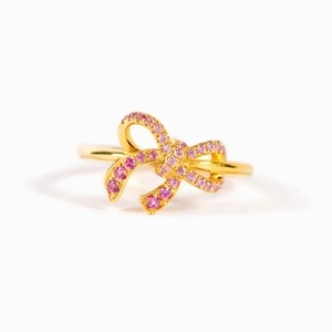 Golden S925 silver ring featuring a sparkling pink zircon pavé butterfly knot design