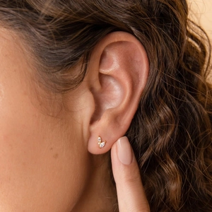 Minimalist S925 sterling silver gold stud earrings with marquise zirconia on earlobe