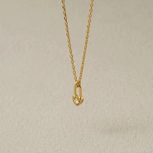 Minimalist S925 sterling silver heart lock pendant necklace with a gold finish and zircon