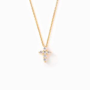 Minimalist s925 silver gold cross necklace with sparkling cubic zirconia on white background