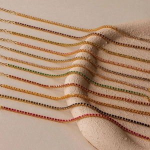 Detailed view of colorful zircon tennis bracelets with gold plating and lobster clasps
