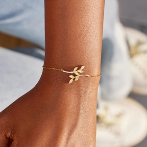 Minimalist S925 sterling silver gold leaf bracelet with marquise-cut zircon on wrist
