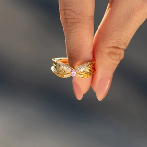 S925 sterling silver butterfly ring with pink marquise stone on model finger