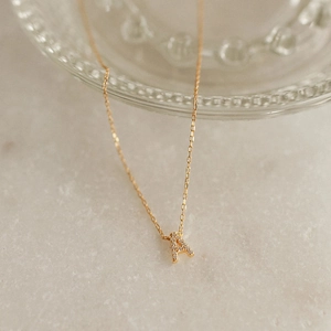 Minimalist S925 sterling silver necklace with gold letter A pendant and sparkling stones
