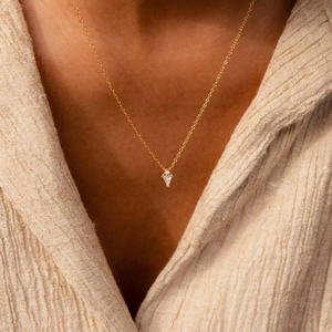 S925 sterling silver gold necklace with kite-shaped zircon pendant on female model