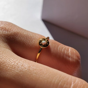 Minimalist S925 sterling silver sun ring with iridescent opal in a golden finish
