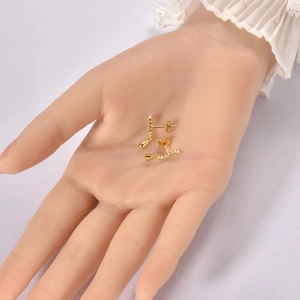 Elegant gold S-shaped S925 silver stud earrings with sparkling crystals and drop pendant
