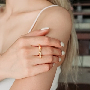 Minimalist adjustable double-layered gold line ring for women on a model finger