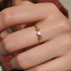 Minimalist S925 sterling silver flower ring with round opal gemstone in golden finish