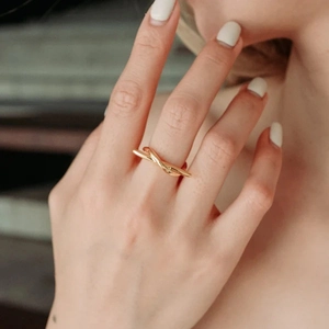 Minimalist adjustable gold twisted ring with an irregular line design for women