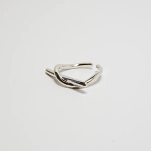Close-up of the knotted minimalist S925 sterling silver adjustable open ring