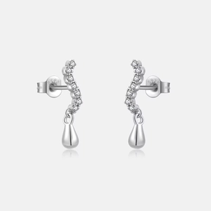 Close-up of S925 sterling silver S-shaped earrings with pavé diamonds and drop pendants