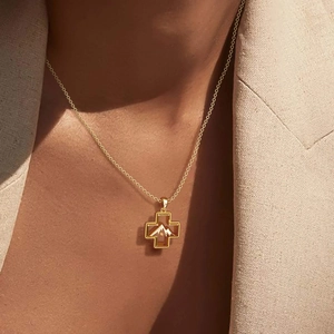S925 sterling silver gold cross necklace with mountain pattern pendant worn on model