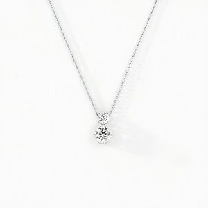 Detail of S925 sterling silver necklace with double round brilliant-cut cubic zirconia