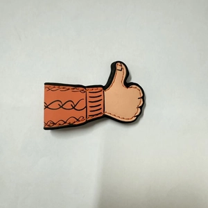 Macro detail of cartoon thumb-up PU leather magnetic bookmark with orange sleeve design