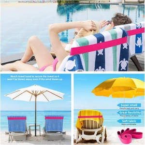 Pink elastic beach towel band for lounge chairs on cruise ship pool decks and sandy beaches
