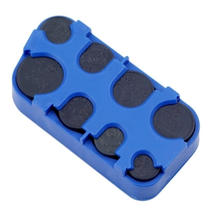 Detailed view of blue plastic coin dispenser with multiple slots for Euro currency sorting