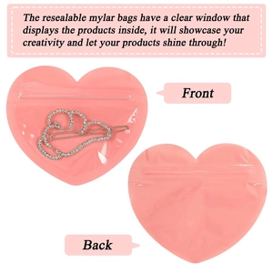 Pink heart-shaped mylar packaging bag with resealable zipper and clear display window