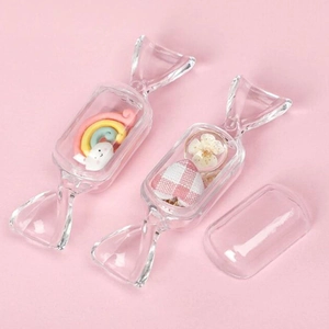 Boîte de rangement transparente en forme de bonbon pour bagues et boucles d'oreilles rose