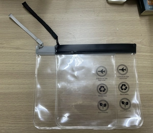 Detail of waterproof EVA travel pouches showing TSA approved logos and hanging straps