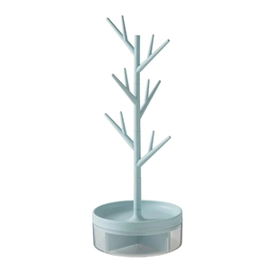 Detail view of branch-shaped jewelry organizer with tray and clear storage drawer