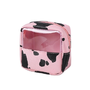 Pink cow print EVA jewelry travel case with transparent PVC window and top zipper closure
