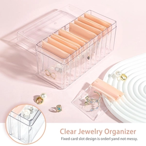 Detail view of 10-slot acrylic jewelry box with pink EVA anti-oxidation storage bags
