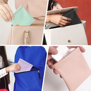 Close-up of portable PU leather makeup pouches with spring clip closure in various colors
