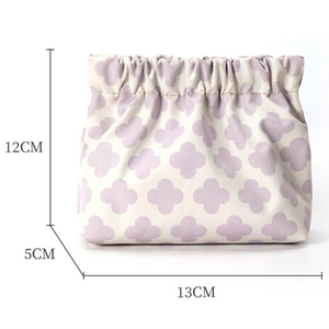 Mini floral travel pouch size details: 13cm length, 12cm height, and 5cm width