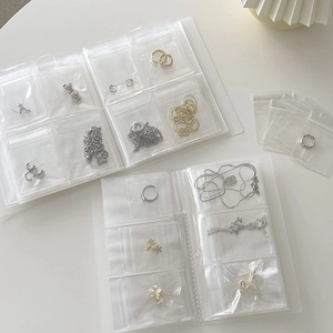 Portable PVC transparent jewelry organizer book with anti-oxidation storage bags