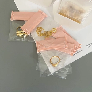 Pink sealing clips and transparent PE bags for jewelry storage and anti-oxidation