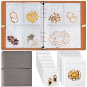 Detail view of the portable PVC jewelry organizer with inner binder rings and storage bags