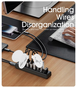 Detail of USB hub with silicone cable labels on office desk for cable organization