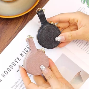 Portable mini leather jewelry box for rings and earrings in pink and black colors