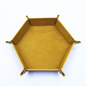 Top view of yellow PU leather hexagonal dice tray with silver metal snaps on white background