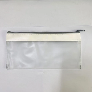 Detail view of the clear PVC pencil case with a gray zipper and white synthetic leather trim