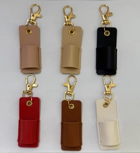 Litchi texture leather lipstick holder keychain set in six various colors with gold clasps